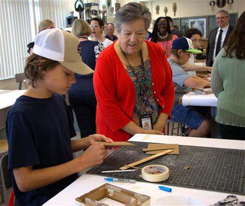 Student with Bonnie Solinsky, Director of Charter Schools and Home Education